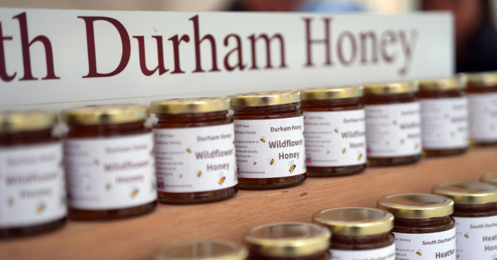 Jars of Durham Honey on display.